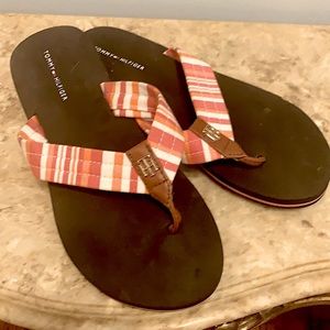 Pink and orange stripped flip flops